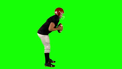 jugador de fútbol americano en pantalla verde