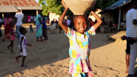 African Girl Carrying Water Pot
