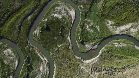 Winding,-Curving-River-in-Green-Landscape,-Aerial-Drone-Top-Down-View