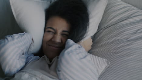 woman annoyed in bed