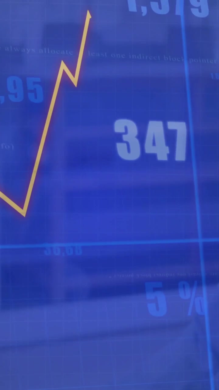 Vertical video: Man typing laptop keys causing blue overlay line-bar charts updating for analytics