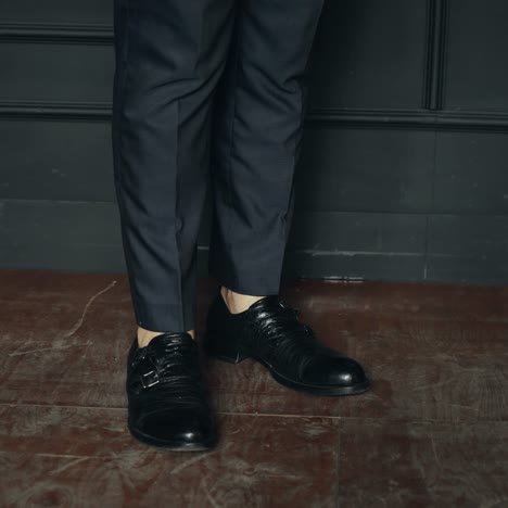 businessman standing in polished shoes