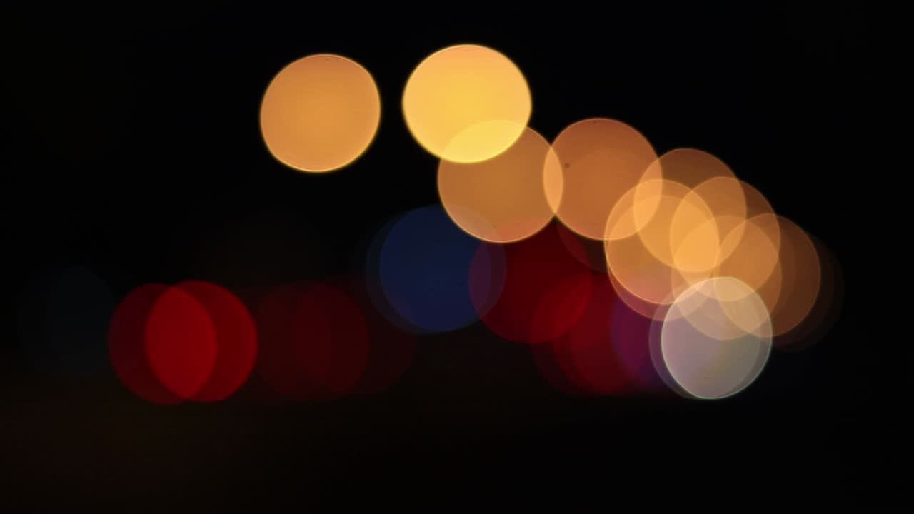 Bokeh lights in the city night background, abstract backgrounds, bokeh background
