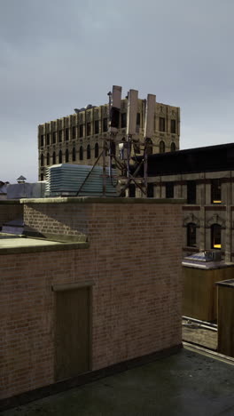 city rooftop view during overcast weather with distant buildings in sight
