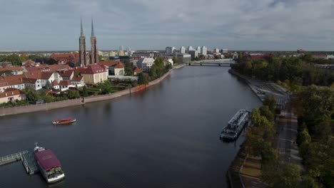 crossing river towards twin towers of cathedral of st