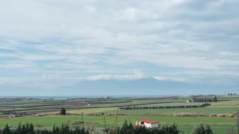 Timelapse-of-nature-with-clouds-farmlands-and-Olympus-Mountain