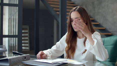 concentrated business woman working with papers. girl reading documents