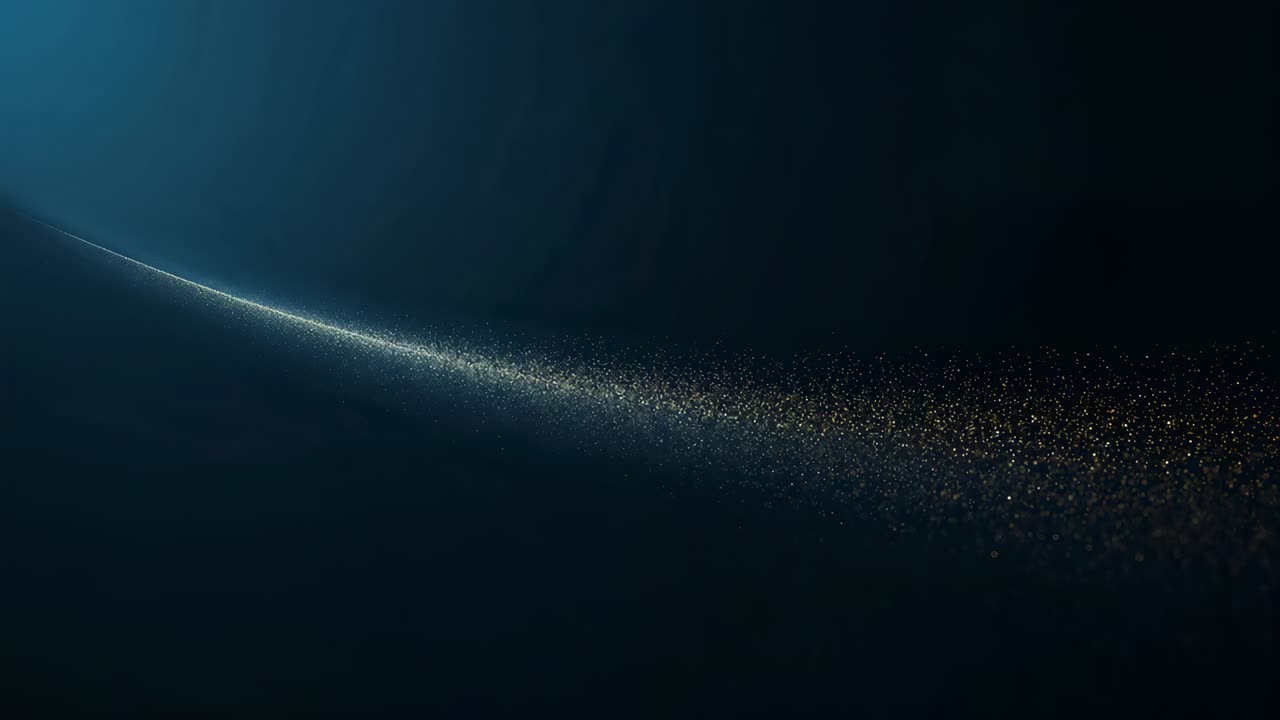 Starting playback, curved golden particle trail building rightward over navy backdrop, blue glow