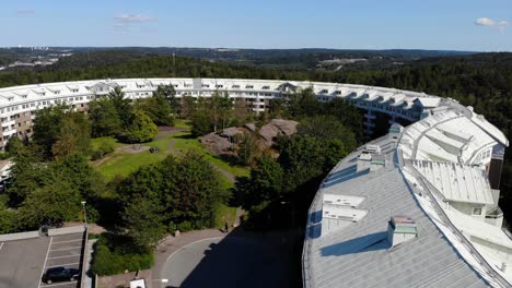 drone aerial view of modern swedish residential apartment buildings in suburbia