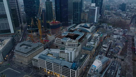 Buildings-in-city.-Aerial-view-of-construction-site-in-city-centre-and-modern-business-towers.-Frankfurt-am-Main,-Germany