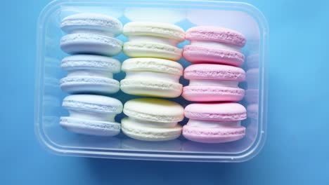 colorful macarons in a container