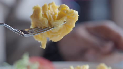 scrambled eggs on a fork