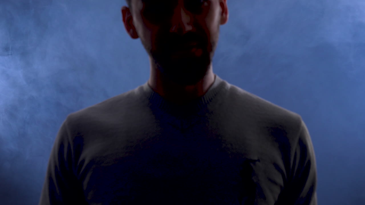 Man in Polo Shirt with Smoke Background