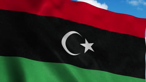 libya national flag waving in the wind, blue sky background. 4k