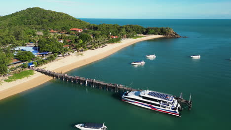 Aerial-View-Of-Ferry-Boat-Docked-In-The-Port-Between-Koh-Samui-And-Koh-Tao-Pralarn-Pier-In-Thailand