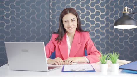 Young-business-woman-showing-her-mind-looking-at-camera.