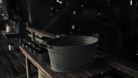 vintage metal bucket on a rustic wooden table