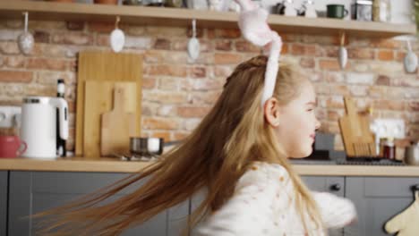 handheld video of girl spinning around in rabbit ears