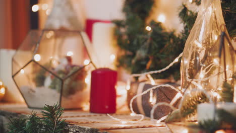 Colorful-alternate-Christmas-and-New-Year-holidays-gift-boxes-on-wood-table-with-blank-space-at-the-end---top-view,-stop-motion