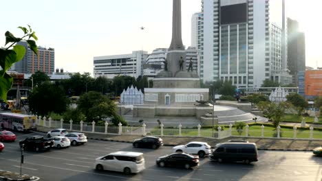 traffic at victory monument in bangkok, thailand.