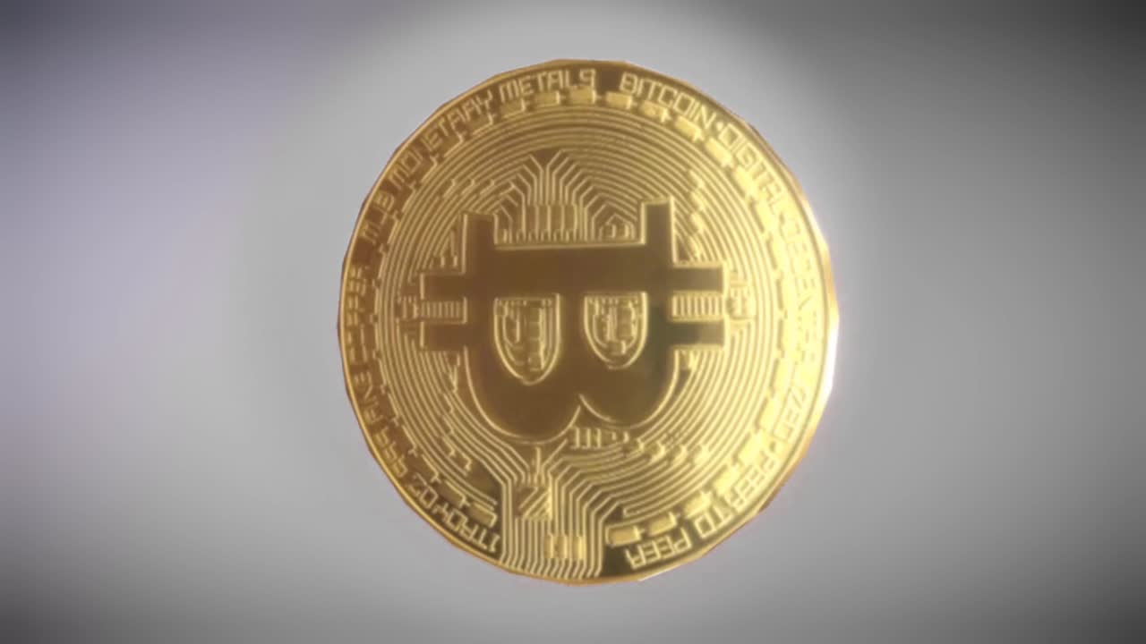 moneda bitcoin girando en animación de criptomonedas en el aire