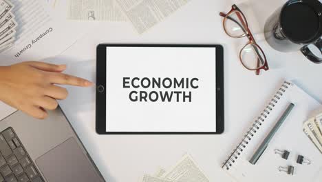 economic growth displaying on a tablet screen