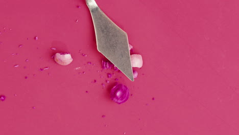 broken eyeshadow palette and spatula