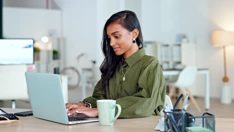 Proud,-happy-and-confident-business-woman-typing