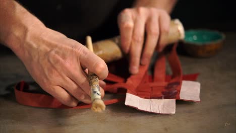 close-up of leatherwork process
