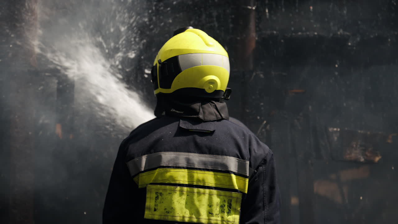 Firefighters trying to extinguish a house on fire