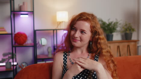 happy calm caucasian woman smiling looking away dreaming resting, good news, feel satisfied at home