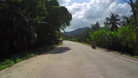 a road in the jungle somewhere in thailand