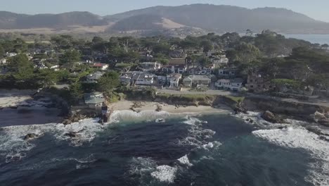 California-West-coast-highway-route-1-coastal-mountains-aerial-view-orbit-left-across-countryside-shoreline