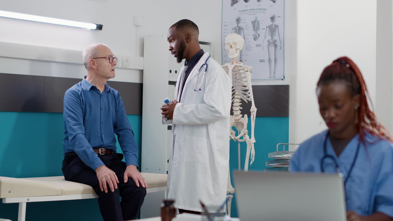 Doctor consulting with patient in clinic