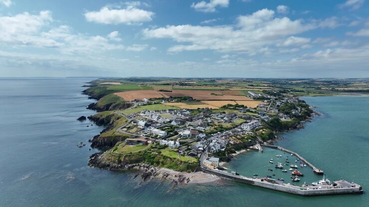 Ballycotton County Cork Ireland aerial view of this quaint fishing village on the edge of the Atlantic Ocean on a summer morning