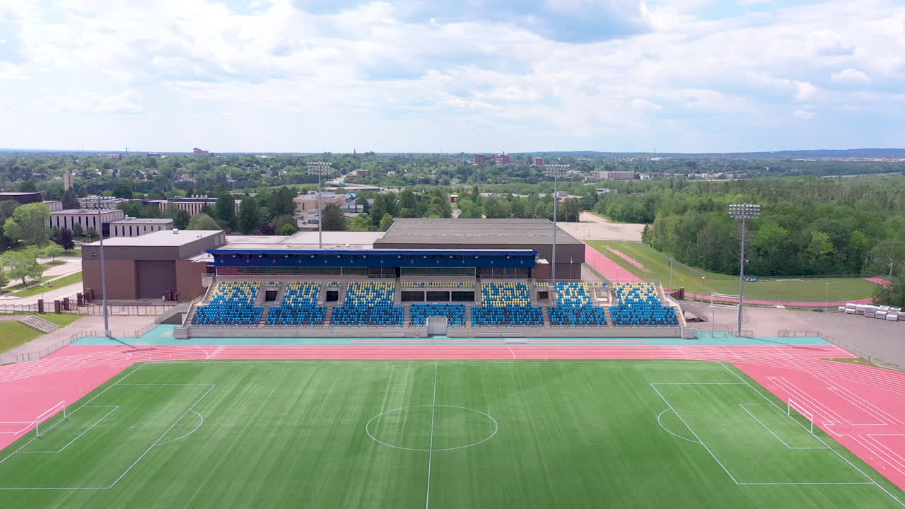 AERIAL: Moving Backward to Reveal Stadium Lights at Moncton Stadium
