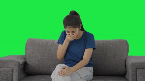 Sick-Indian-teenage-girl-having-a-cold-and-cough-Green-screen