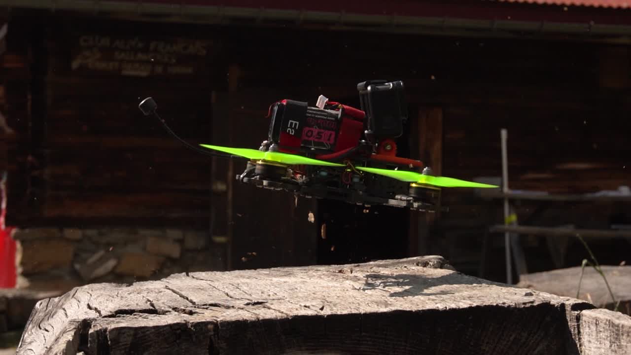 FPV drone taking off the side of a fountain (slow-mo)