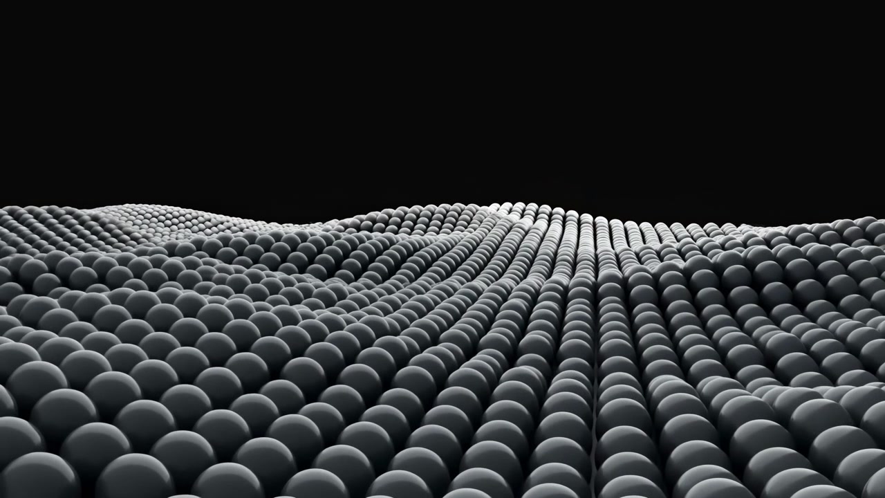 Reflective round forms shift through coordinated waves across textured field, showing repeating curves, soft highlights, and deep contrast with changing perspective in abstract monochrome composition.