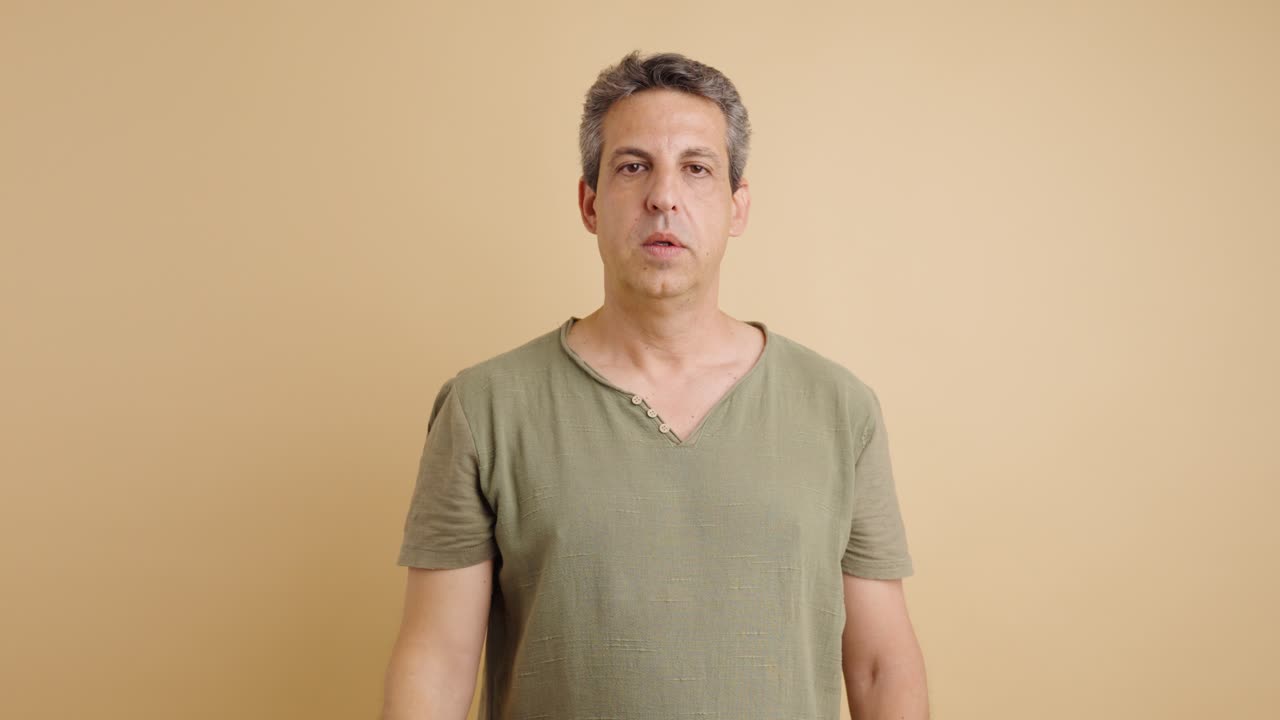 Man giving thumbs down gesture