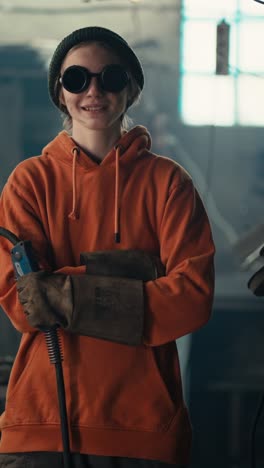 young woman welder