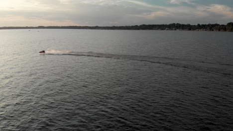 drone-shot-jet-ski-passing-by