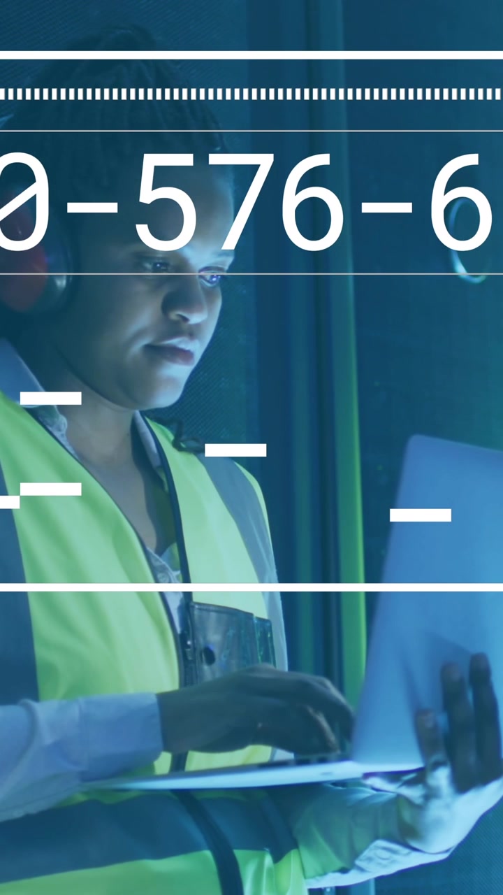 Animation of changing numbers, lines, african american female engineer checking server using laptop