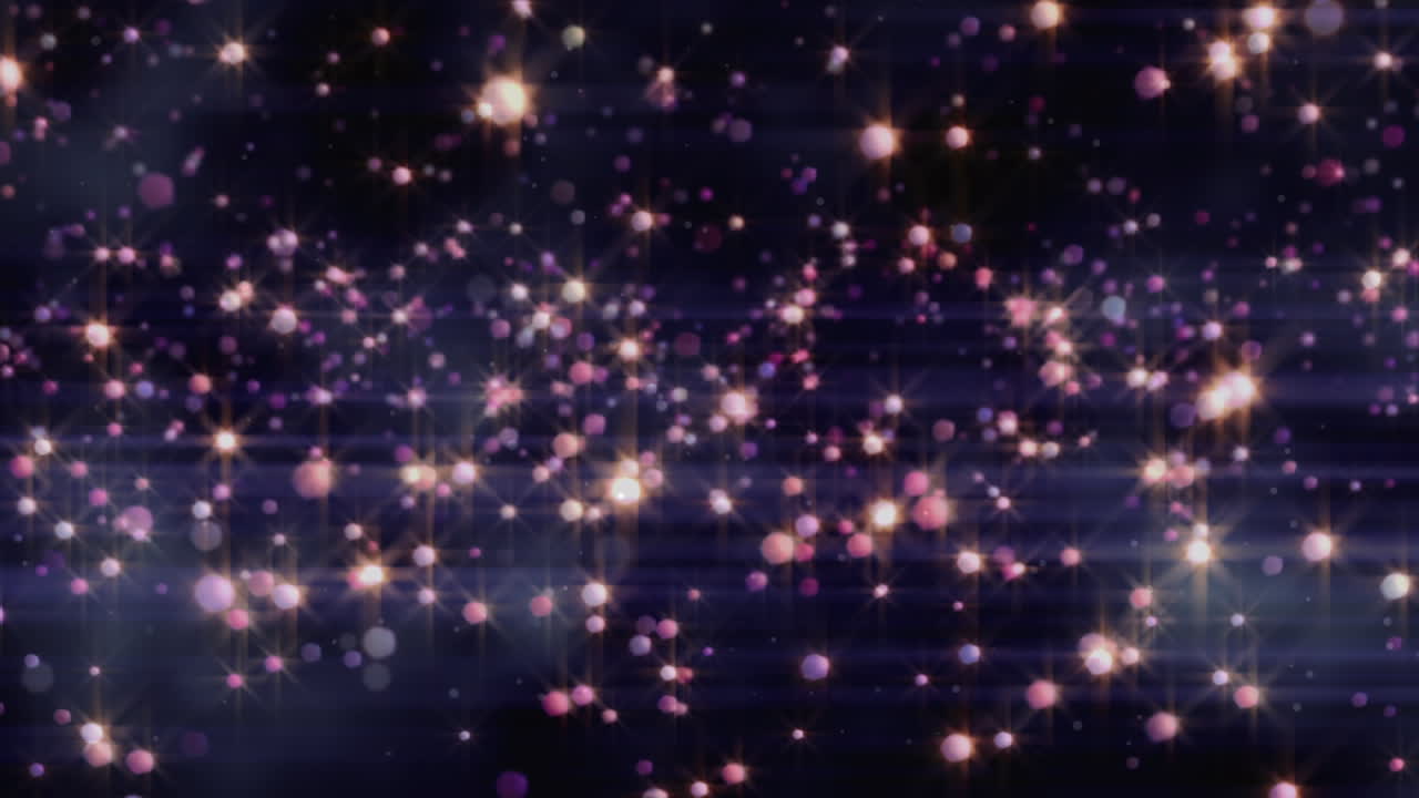 검은 바탕 위에 빛나는 다채로운 반점의 애니메이션