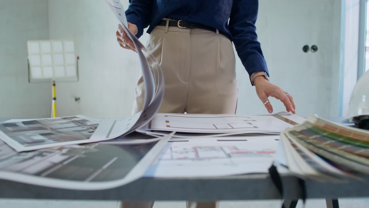 Architect Reviewing Design Plans and Samples