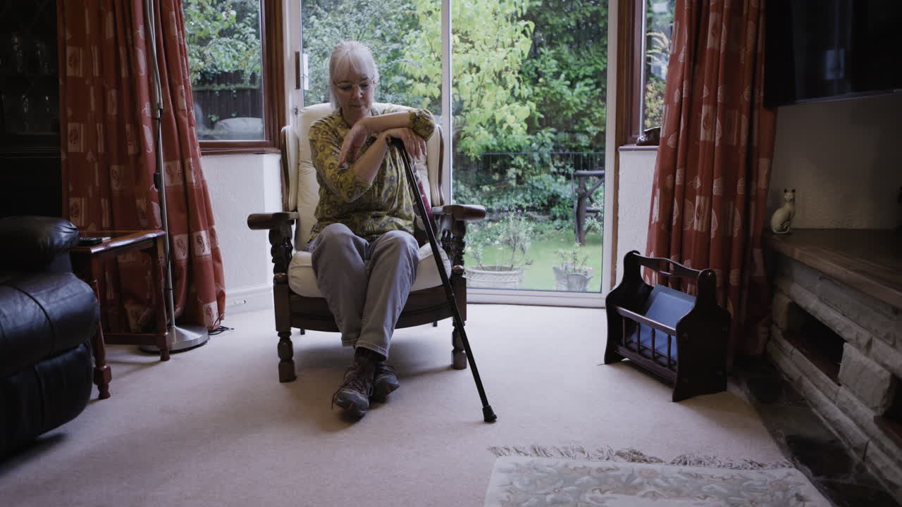 Woman sitting in a chair in a living room