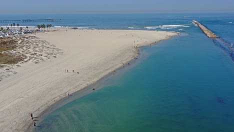 Panning-Drone-shot-of-Ocean-Beach-Dog-Beach-looking-out-to-the-horizon-you-can-see-Ocean-Beach-Pier