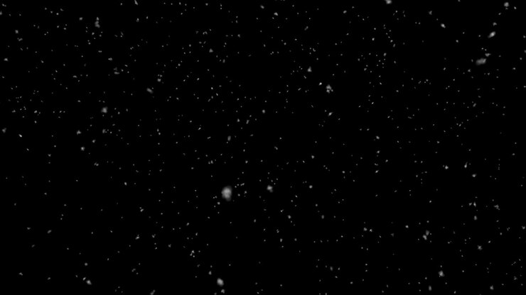 Snow falling on black background