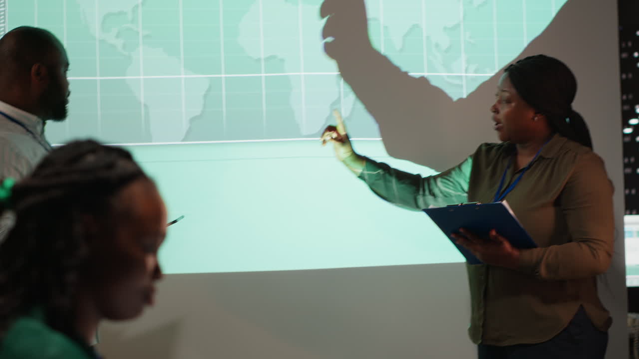 Black business advisors revealing monthly data insights during briefing