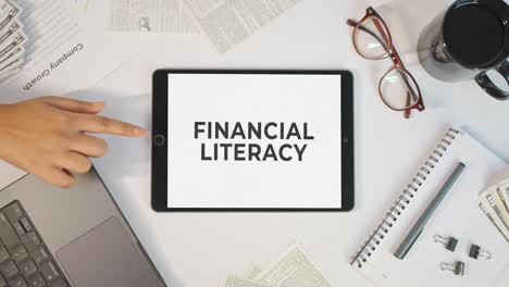 financial literacy displaying on a tablet screen